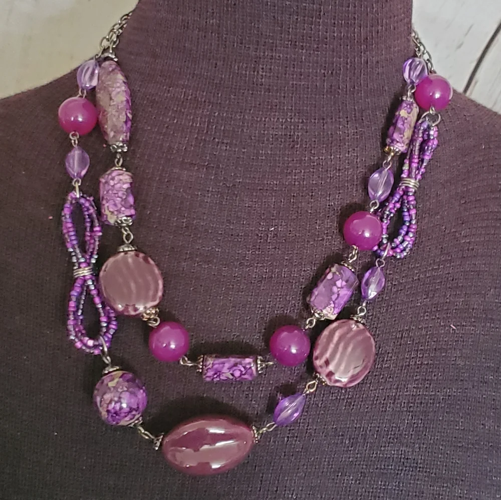 Gunmetal double strand necklace with purple seed bead bows and marble look beads